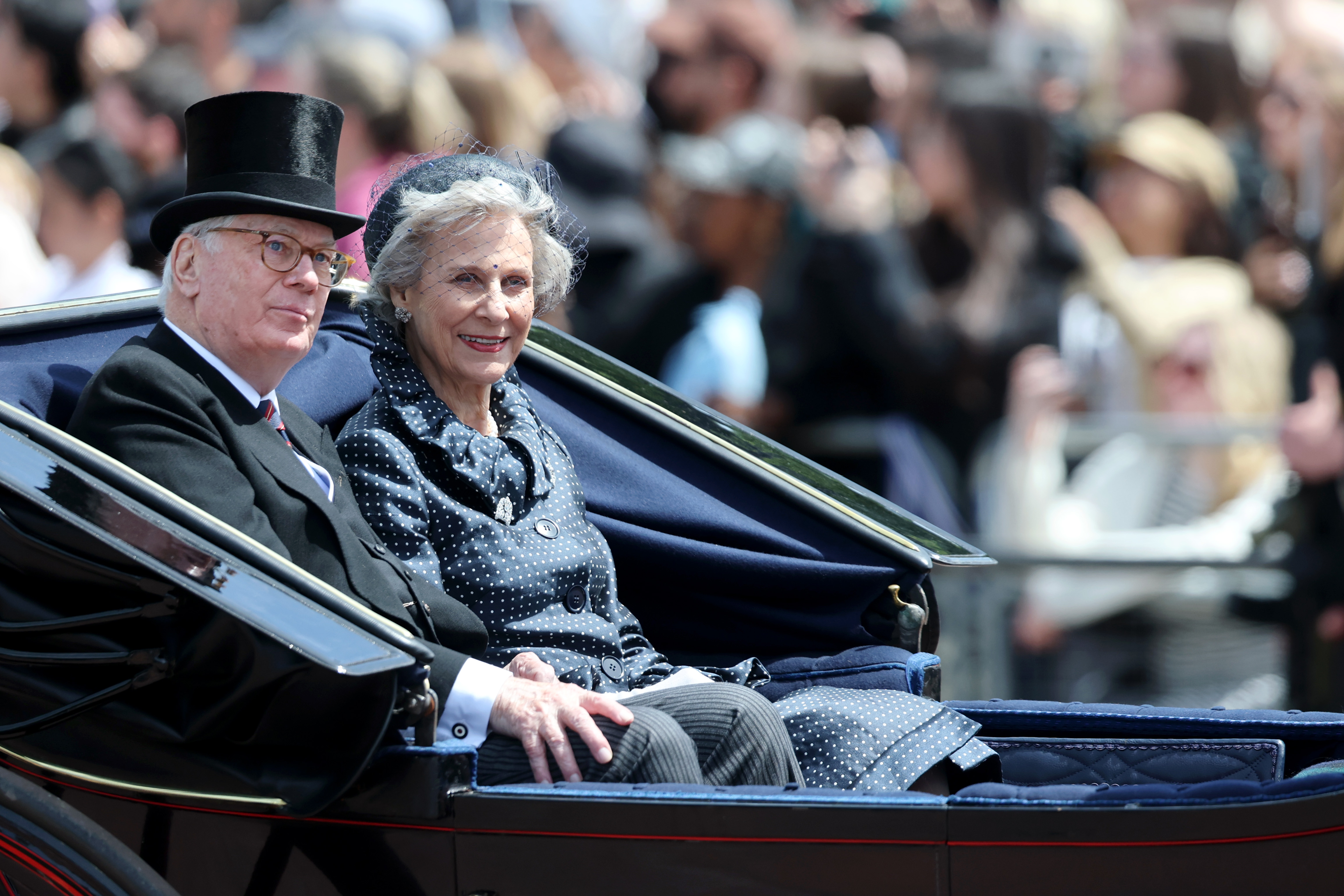 Prince Richard, Duke of Gloucester and Birgitte, Duchess of Gloucester pass through the Trooping The Colour parade.