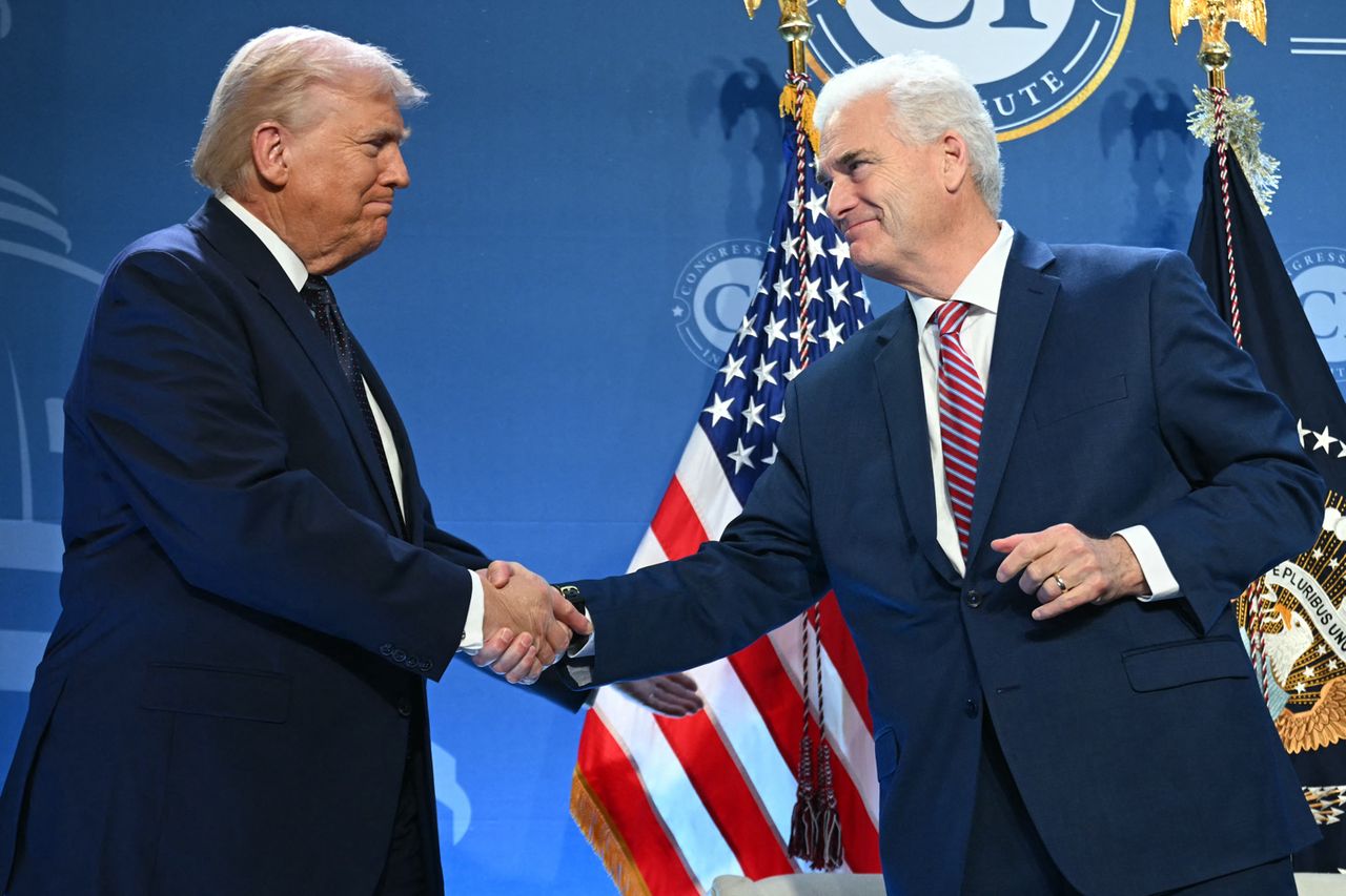 President Donald Trump shakes hands with Rep. Tom Emmer, R-Minn., at Trump National Doral in Miami, Fla., on March 9.Credit: SAUL LOEB / AFP via Getty