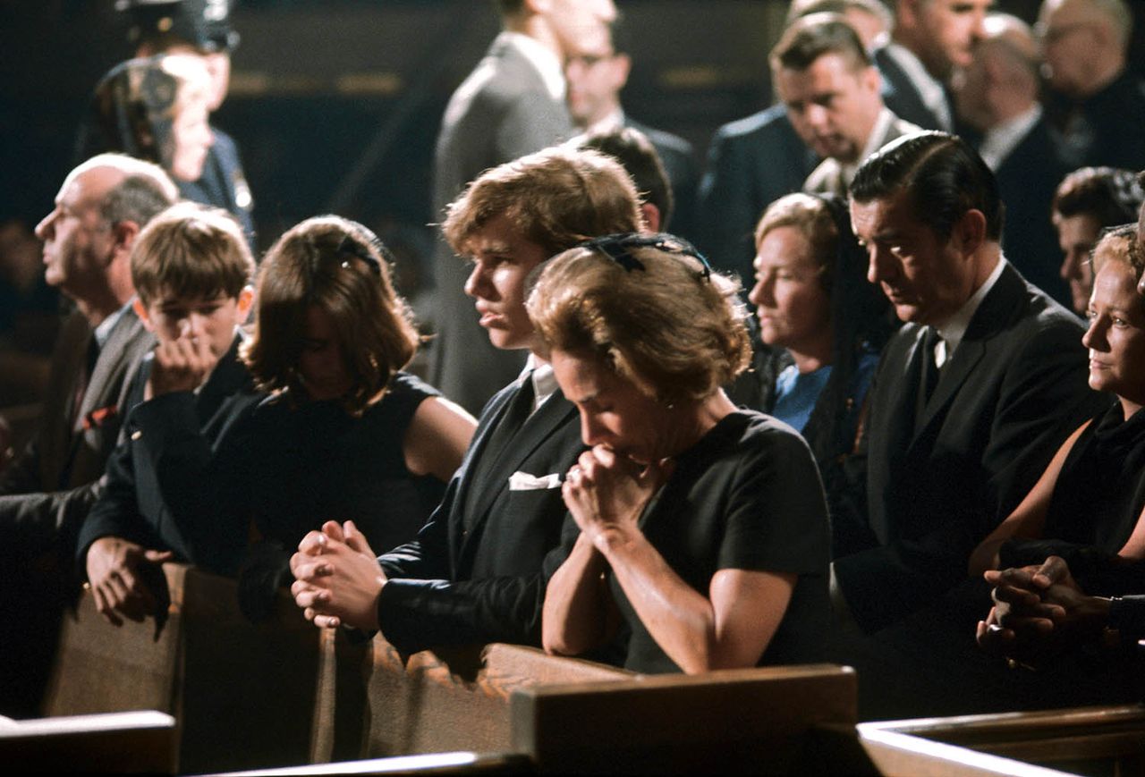 Praying at Robert Kennedy's Funeral (Original Caption) New York: Her head bowed in prayer as her husband lay in state, Mrs. Ethel Kennedy knelt with (L-R) Robert Jr., Kathleen and Joseph in prayer at St. Patrick's Cathedral. Ethel Kennedy and her children and RFK's funeral on June 7, 1968Credit: Bettmann Archive/Getty
