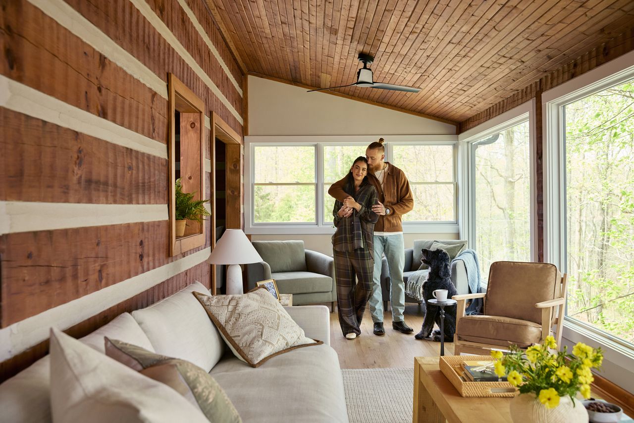 George Kittle and Wife Claire Show Off Their Newly Renovated Nashville Cabin Claire and George Kittle in the sunroomCredit: Pottery Barn