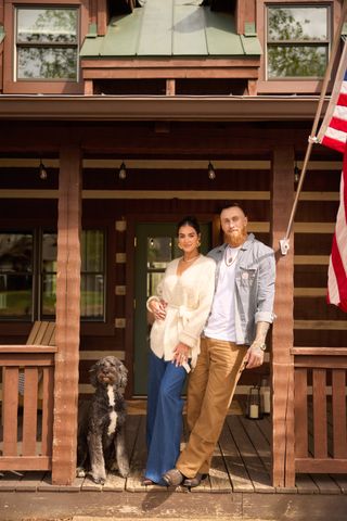 George Kittle and Wife Claire Show Off Their Newly Renovated Nashville Cabin Claire and George Kittle on the front porchCredit: Pottery Barn