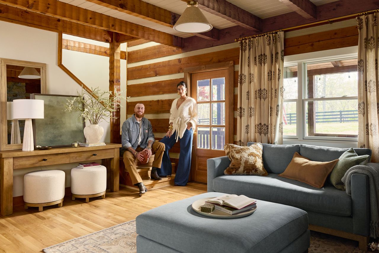 George Kittle and Wife Claire Show Off Their Newly Renovated Nashville Cabin George and Claire Kittle in their front sitting roomCredit: Pottery Barn