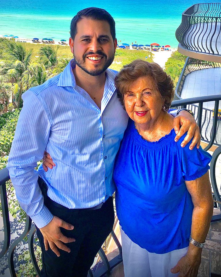 From left: Michael Noriega and his grandmother Hilda on her balcony at Champlain Towers South.Credit: Michael Noriega