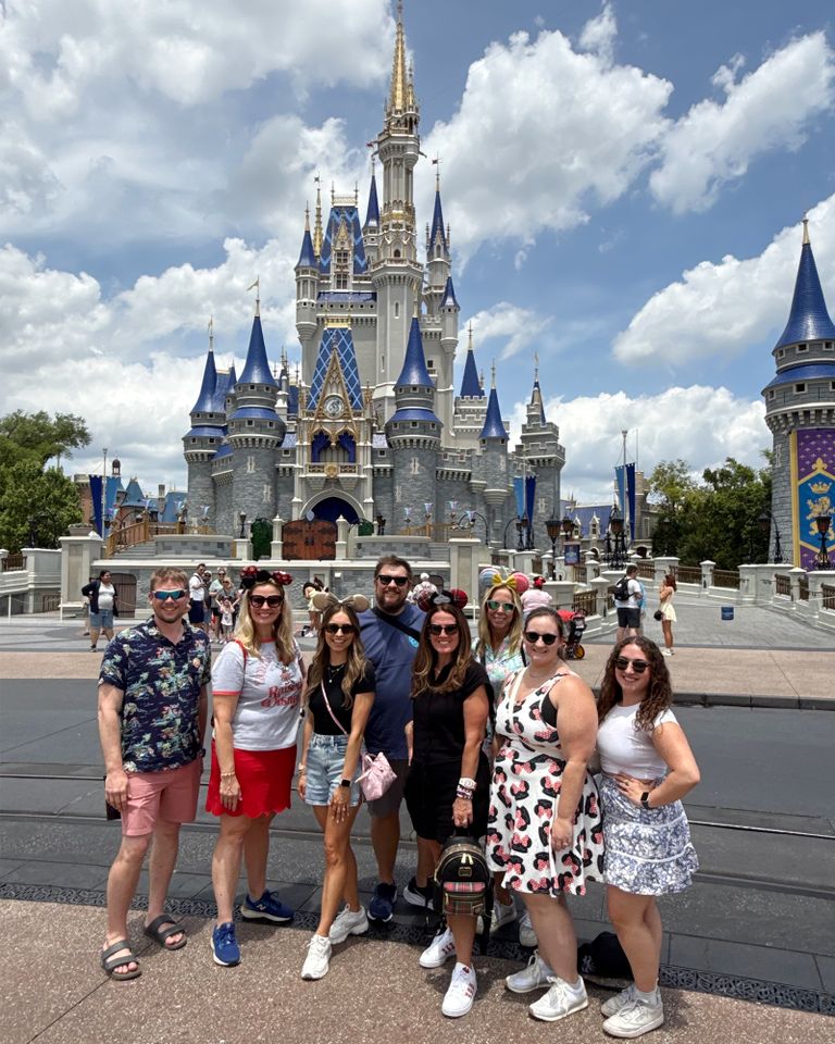 Kelly Dickson and her VIP tour group poses in front of Cinderella's Castle at Magic Kingdom.Credit: Courtesy of Kelly Dickson
