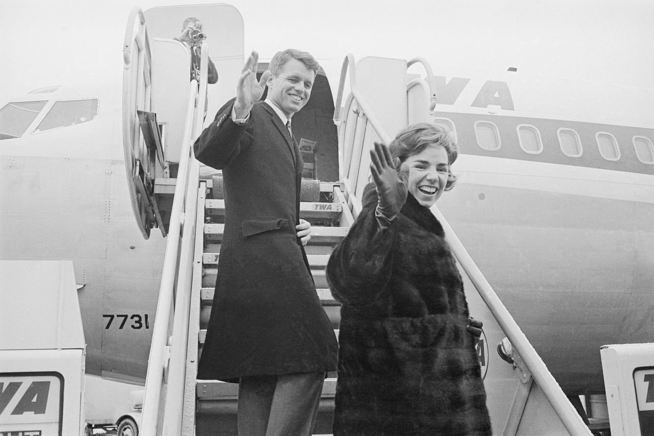 (Original Caption) Attorney General Robert F.Kennedy and his wife, Ethel, wave from ramp of plane as they prepare to depart from here today on a globe-circling, 26-day good-will tour to Japan, Indonesia, Iran, Italy, the Netherlands and West Berlin. The Attorney General was reported eager to explain the New Frontier's meaning to young people in Europe and Asia. Robert F. Kennedy and his wife, Ethel, wave from the plane as they embark on a 26-day goodwill tour around the worldCredit: Bettmann/Getty Images