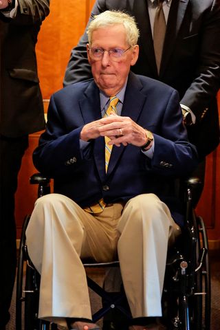 Kentucky Sen. Mitch McConnell in a wheelchair at the Capitol on April 13, 2026