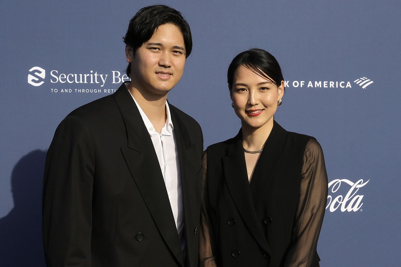 Shohei Ohtani and Mamiko Tanaka arrive at the Los Angeles Dodgers Foundation's 2024 Blue Diamond Gala at Dodger StadiumCredit: Kevin Winter/Getty
