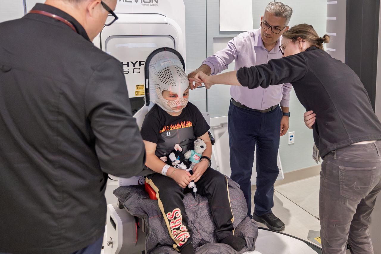 Stephen wears a mask to help him stay still during treatmentCredit: Kurt Hickman/Stanford Medicine