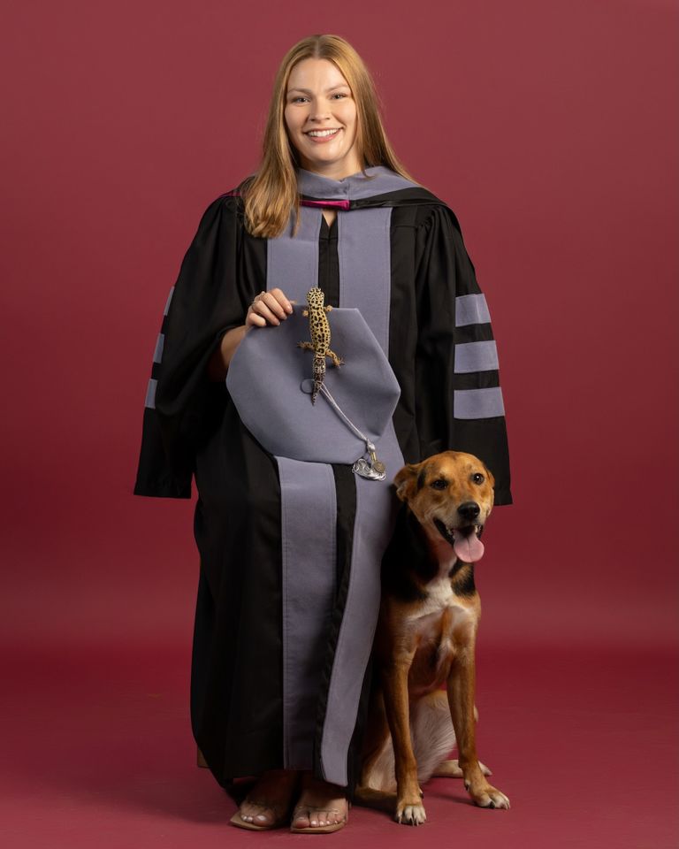 he Virginia-Maryland College of Veterinary Medicine Class of 2026 in their commencement regalia with their pets. Christa Clark with her spotted leopard gecko Momo and her dog FernCredit: Madison Brown/Virginia Tech