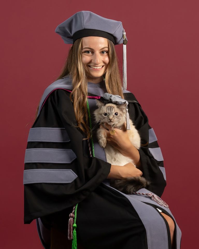 he Virginia-Maryland College of Veterinary Medicine Class of 2026 in their commencement regalia with their pets. Mia Damiano with her cat WillowCredit: Madison Brown/Virginia Tech