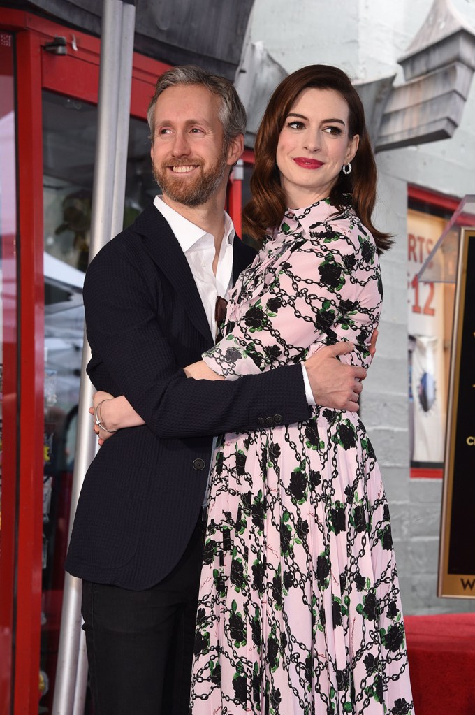Adam Shulman and Anne Hathaway Cuddle Close