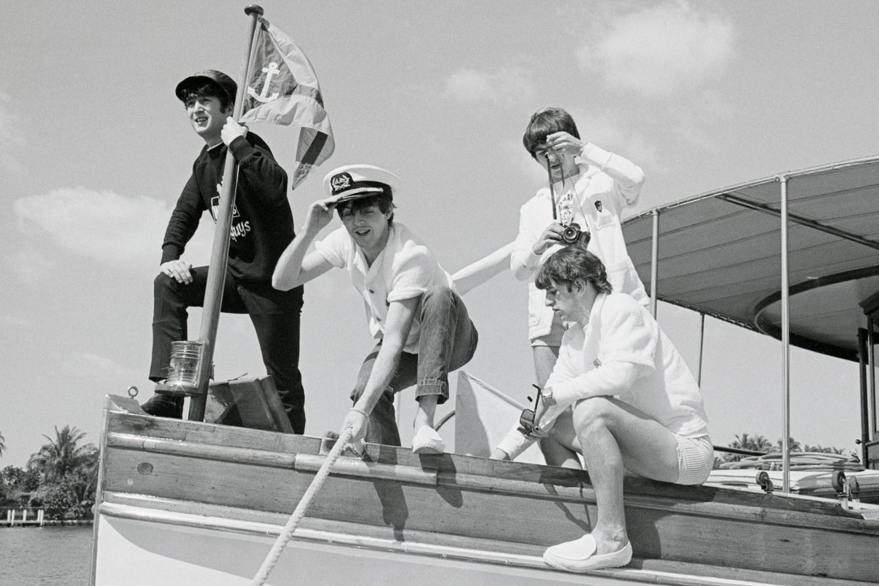 The Beatles on vacation in Miami BeachCredit: Bettmann Archive