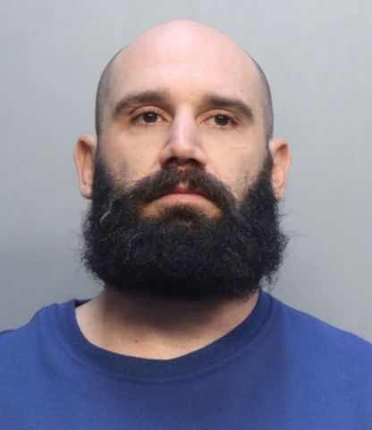 Corey Hutterli A mugshot of Corey HutterliCredit: Miami Beach Police