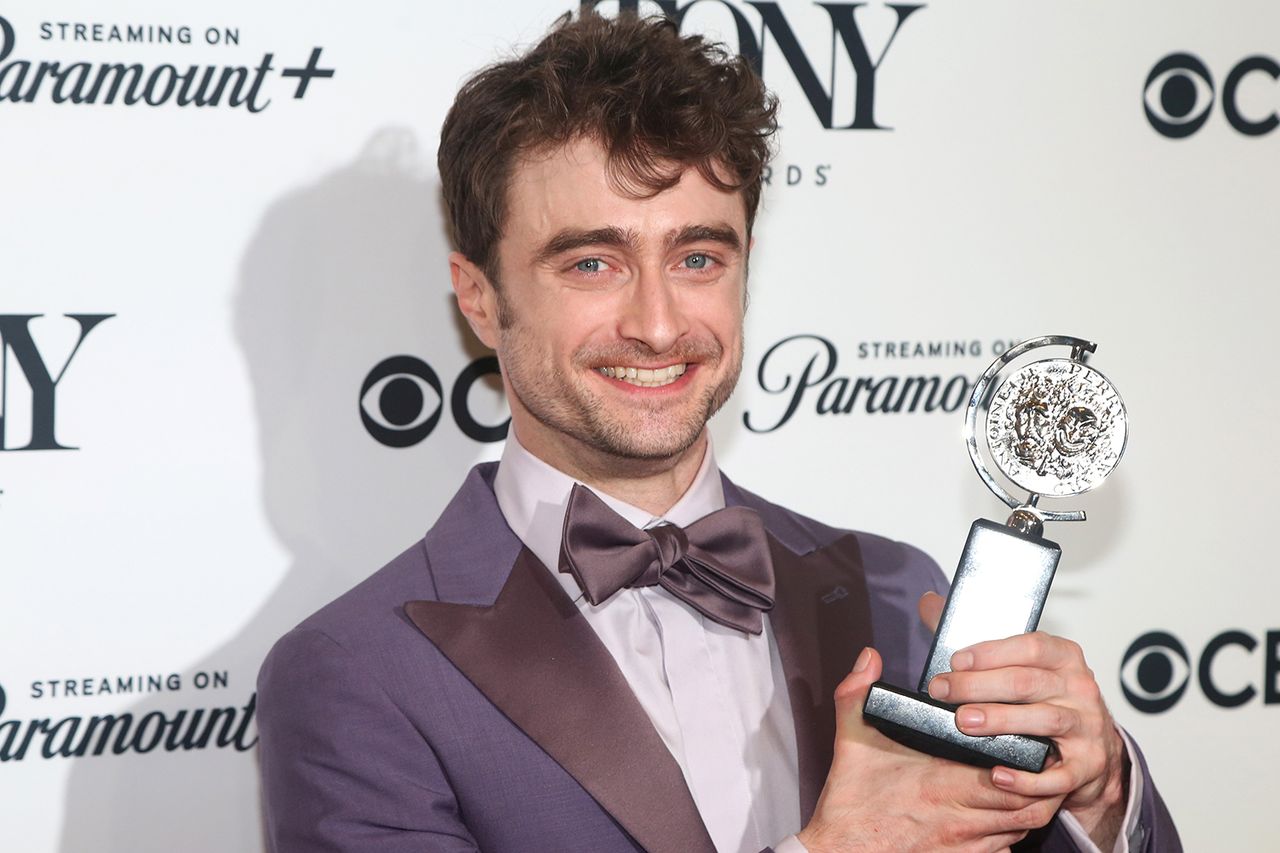 Daniel Radcliffe holds up his Tony Award in 2024.Credit: Bruce Glikas/FilmMagic