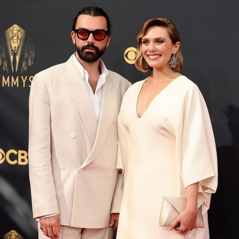 73rd Primetime Emmy Awards - Arrivals Robbie Arnett and Elizabeth Olsen at the 2021 Emmy Awards.Credit: Rich Fury/Getty