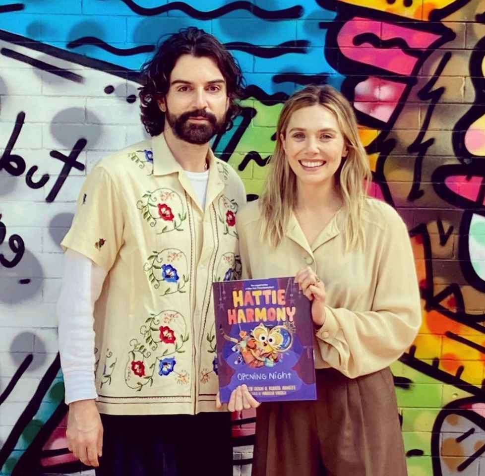 Elizabeth Olsen and Robbie Arnett with their book Robbie Arnett and Elizabeth Olsen with their book 'Hattie Harmony'Credit: Hattie Harmony Instagram