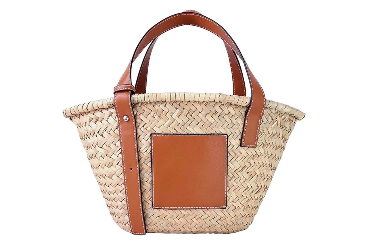 JAYAVENTURA Straw Basket Tote Bag for Women PU Leather Strap Hollow Woven Top Handle Straw Purses and Handbags Credit: Amazon