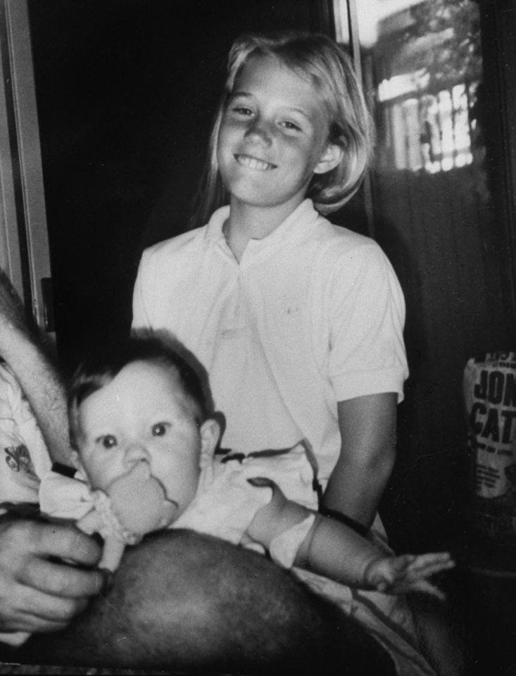 Jaycee Dugard smiling as she stands next to her baby half-sister Shana. Jaycee Dugard with her baby half-sister Shana.Credit: Kim Komenich/Getty