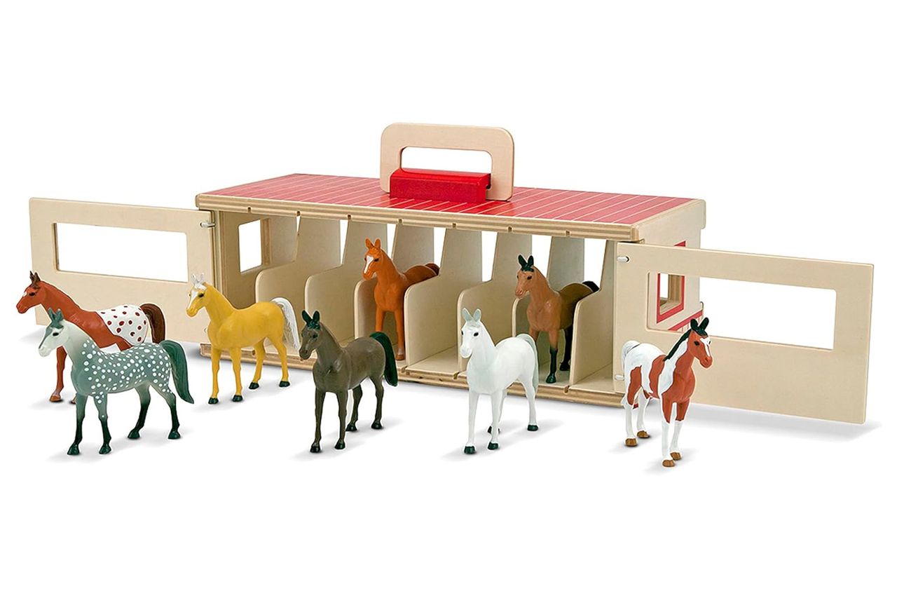 Melissa & Doug Take-Along Show-Horse Stable Play Set Credit: Amazon