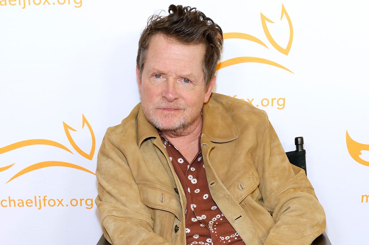 Michael J Fox seated at an event wearing a brown jacket with a patterned shirt underneath Michael J. Fox in Nashville in April 2025Credit: Jason Kempin/Getty