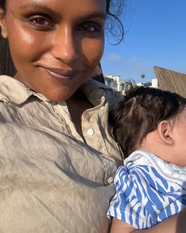 Mindy Kaling 4th july with baby anne on beach instagram Mindy Kaling and AnneCredit: Mindy Kaling/Instagram