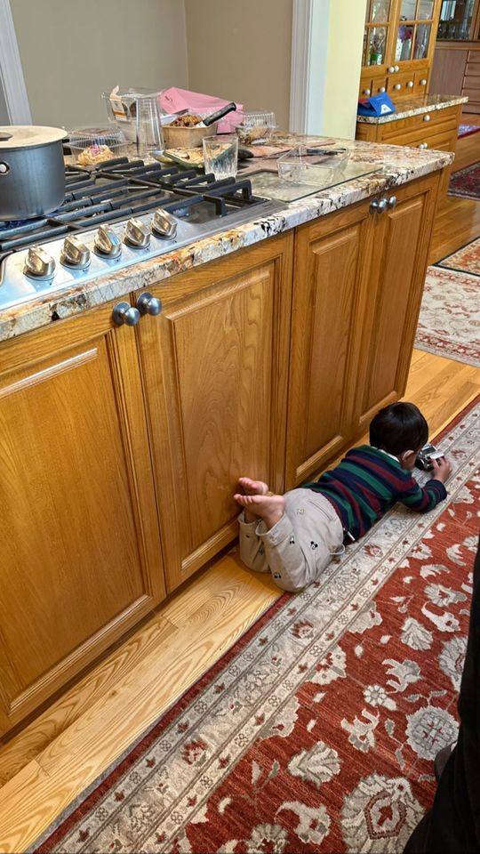 Mindy Kaling's Son Spencer Hides Out For a Moment with His Car on Thanksgiving Mindy Kaling's son Spencer playing in the houseCredit: Mindy Kaling Instagram