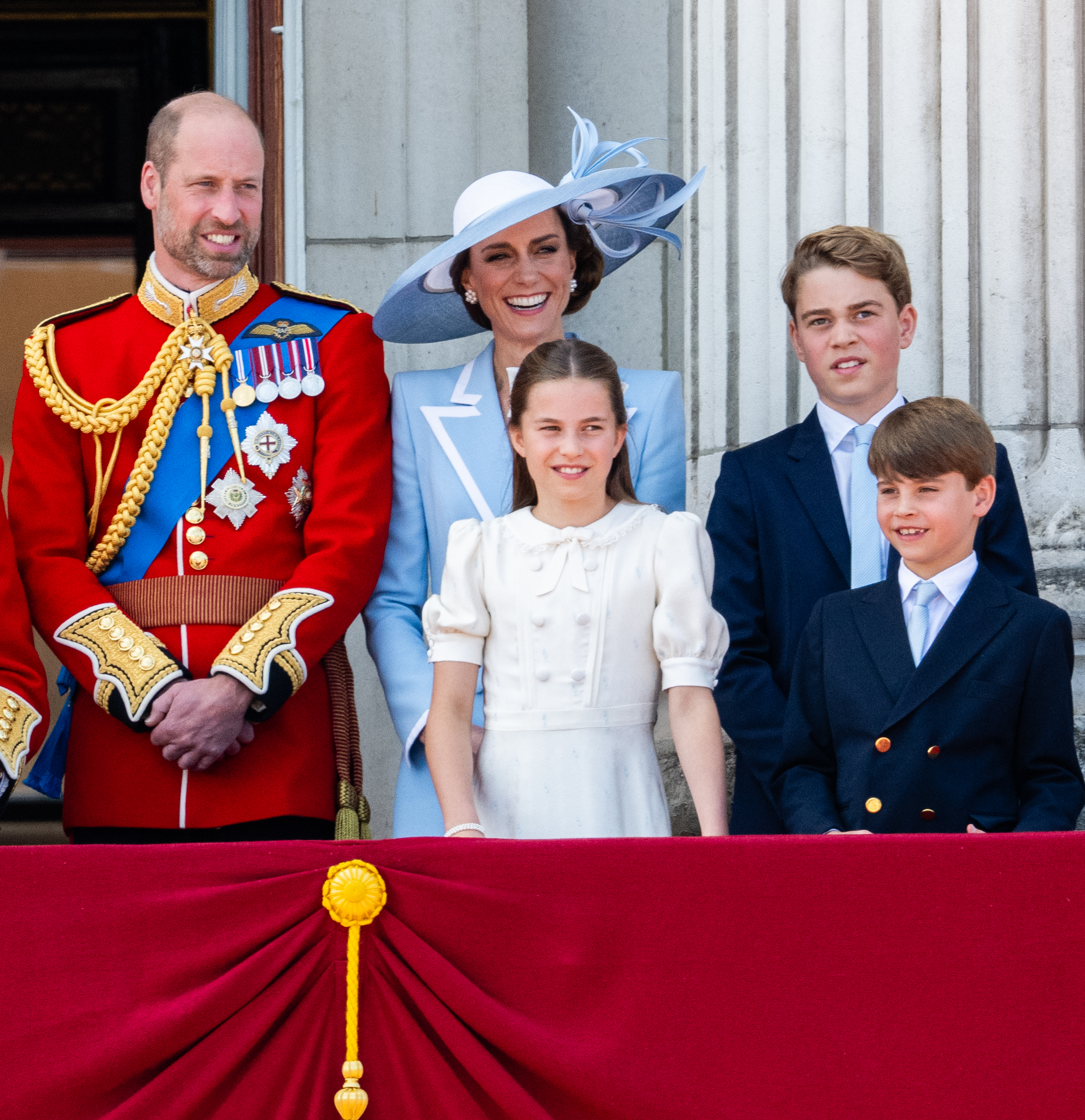 Prince William, Prince of Wales, Princess Charlotte of Wales, Catherine, Princess of Wales, Prince George of Wales and Prince Louis of Wales watch an RAF flypast from the balcony of Buckingham Palace during Trooping The Colour.