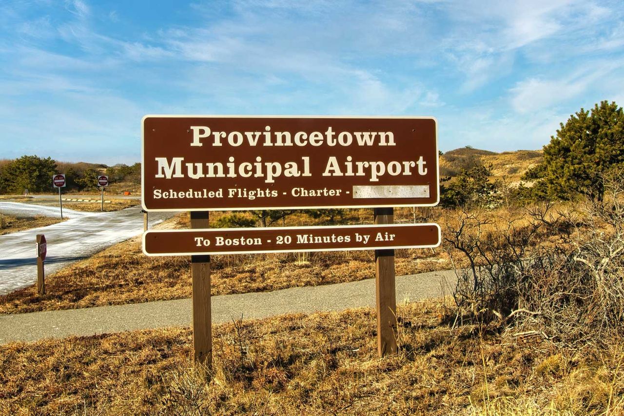 Provincetown Airport sign promoting fast trips to Boston from Outer Cape Cod, near Provincetown, Massachusetts Provincetown Municipal Airport sign in Provincetown, Mass.Credit: Shutterstock