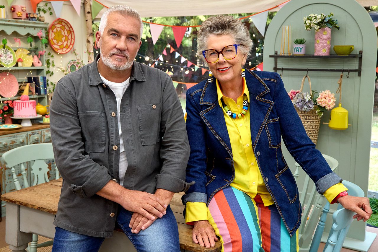 Paul Hollywood and Prue Leith sitting together at a table in a decorated setting Paul Hollywood and Prue Leith on 'The Great American Baking Show'Credit: ROKU