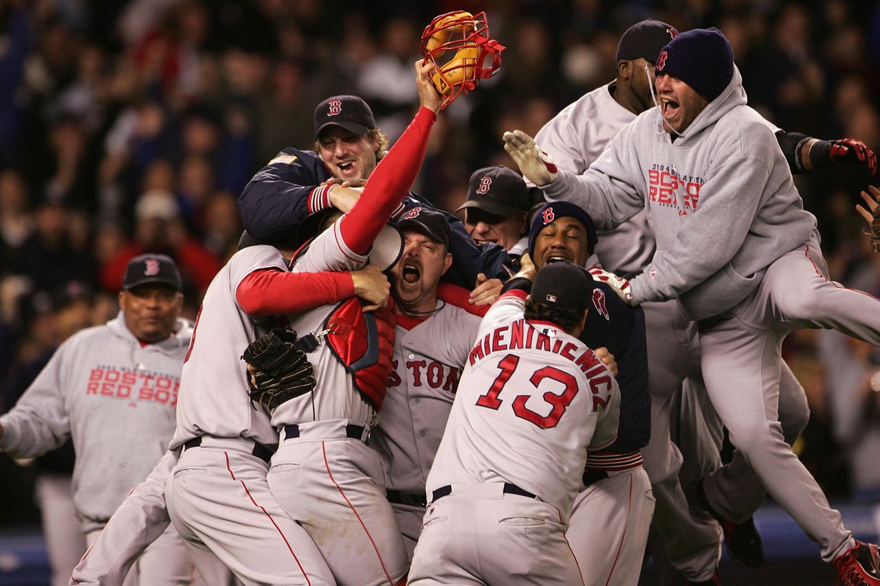 The Boston Red Sox celebrate after winning game seven of the American League Championship Series on October 20, 2004 in New York City.Credit: Doug Pensinger/Getty