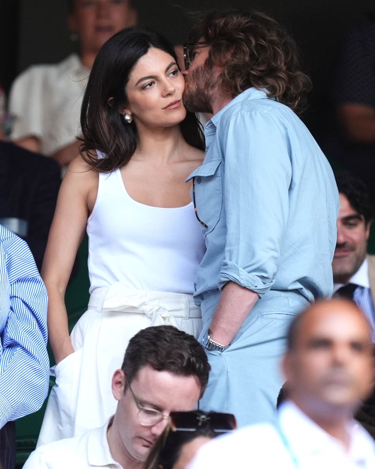 Andrew Garfield and Monica Barbaro watching the action on centre court on day six of the 2026 Wimbledon Championships at the All England Lawn Tennis and Croquet Club, London. Monica Barbaro and Andrew Garfield at Wimbledon on July 4, 2026Credit: Mike Egerton/PA Images via Getty