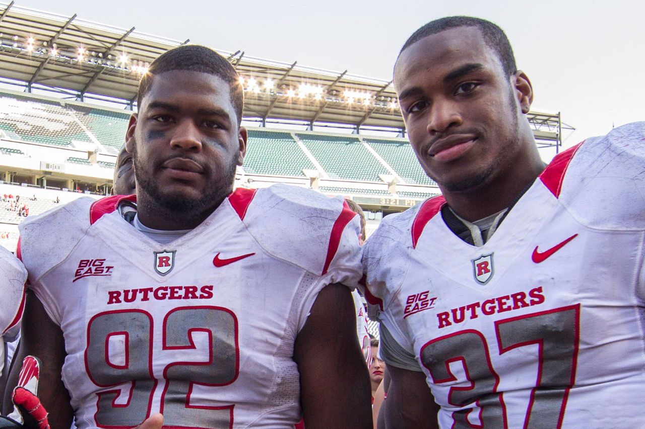 Rutgers Scarlet Knights defensive end Ka'Lial Glaud (13), defensive lineman Jamil Merrell (92) and linebacker Jamal Merrell (37) pose following the NCAA game between the #15 Rutgers Scarlet Knights and the Temple Owls at Lincoln Financial Field in Philadelphia, Pennsylvania. The Rutgers Scarlet Knights beat the Temple Owls, 35-10. Jamil and Jamal MerrellCredit: Cal Sport Media via AP