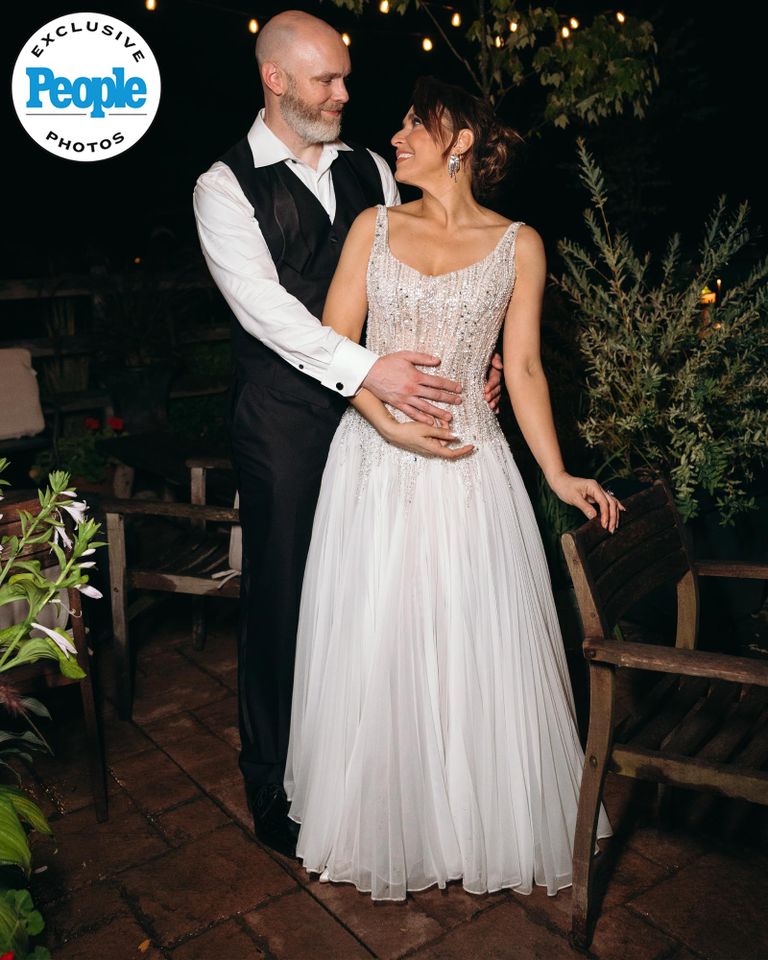 David Godar and Jessica Vosk pose in their late-night wedding reception looksCredit: Laurel Hinton