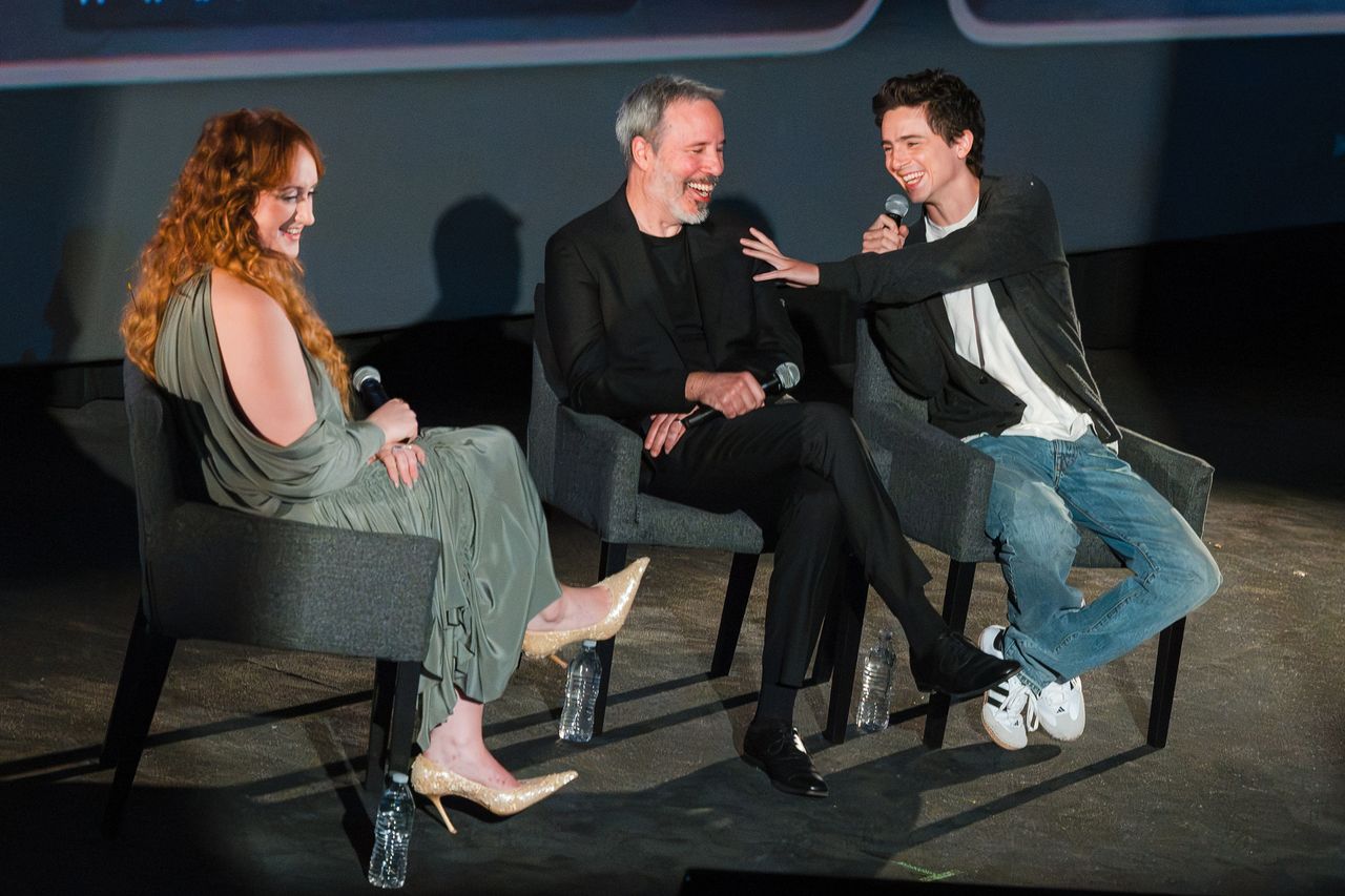 Moderator Brittany Broski, Denis Villeneuve, and Timothee Chalamet attend the Moderator Brittany Broski, Denis Villeneuve, and Timothée Chalamet attend the “Dune: Part Three” Global IMAX Fan Event for Warner BrosCredit: David Jon/Getty