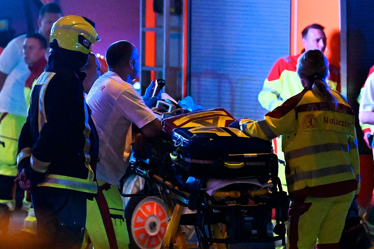 Emergency personnel and police work near the scene where one person was killed and around 15 injured after a car is believed to have hit the crowd on the outskirts of the Christopher Street Day (CSD) parade in Berlin, on July 25, 2026. Emergency personnel and police work near the scene in Berlin on July 25, 2026.Credit: RALF HIRSCHBERGER / AFP via Getty