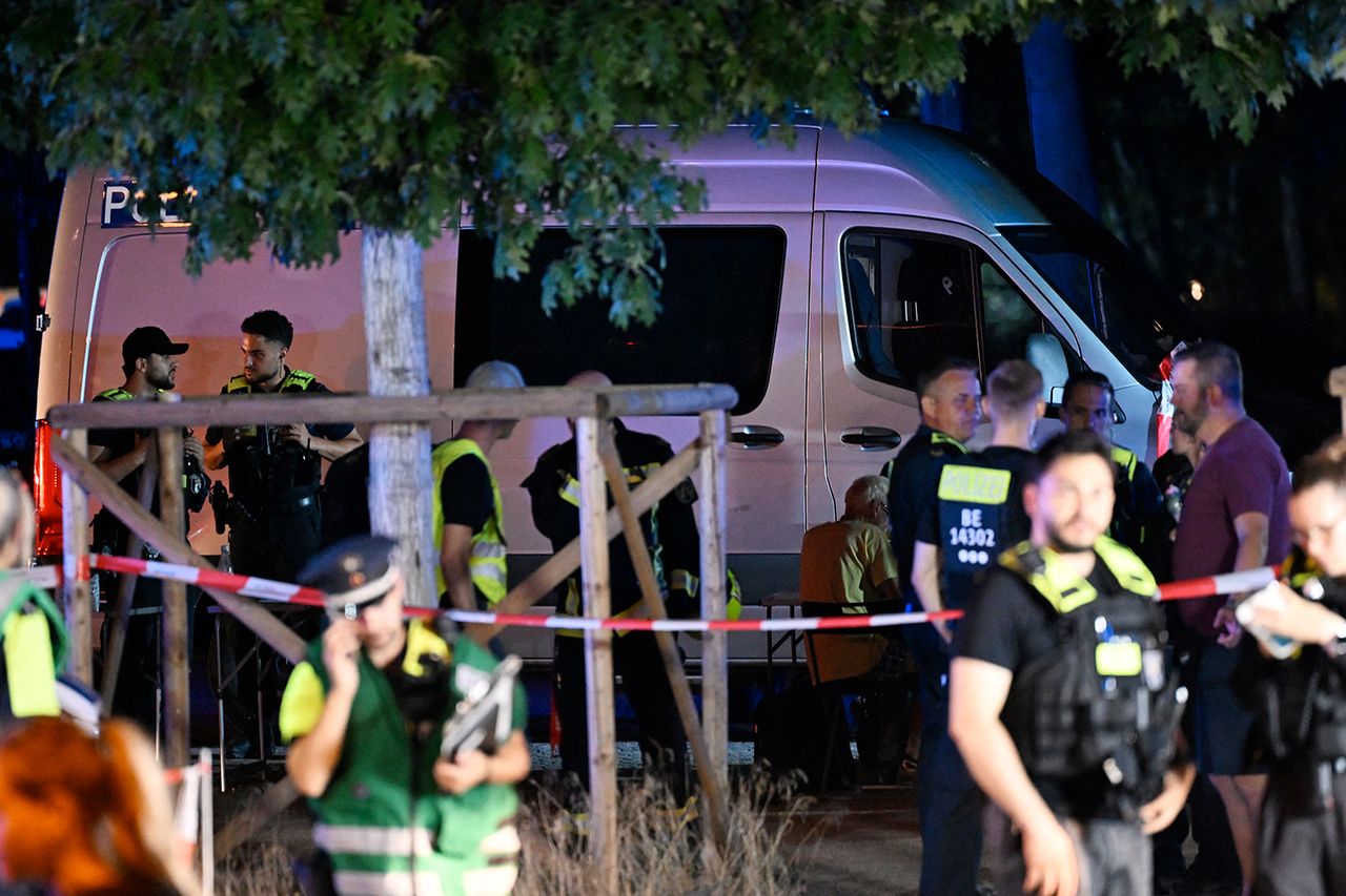 Police work near the scene where one person was killed and around 15 injured after a car is believed to have hit the crowd on the outskirts of the Christopher Street Day (CSD) parade in Berlin, on July 25, 2026. Police work near the scene in Berlin on July 25, 2026.Credit: RALF HIRSCHBERGER / AFP via Getty