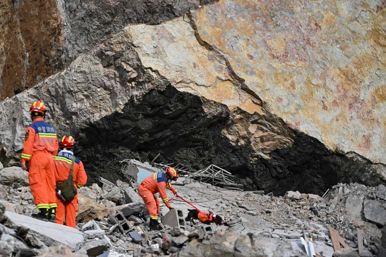 Rescue workers with search dogs conduct operations at a landslide site on July 17, 2026 in Chongqing, China Rescue team members at the scene of the landslide on July 17Credit: He Penglei/China News Service/VCG via Getty