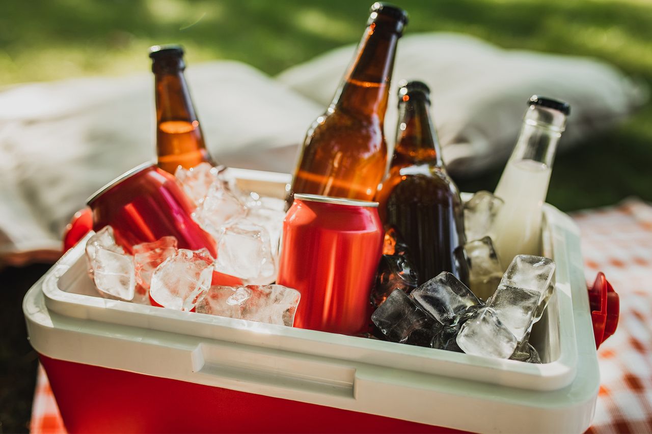 Cooler full of assorted drinks.Credit: Getty