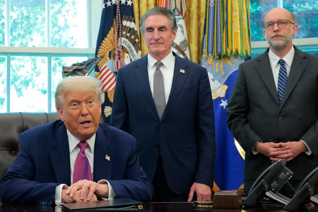 Donald Trump, joined by Interior Secretary Doug Burgum and Director of the Office of Management and Budget Russell Vought, delivers a statement on natural disaster preparedness in the Oval Office on June 10, 2025Credit: Anna Moneymaker/Getty