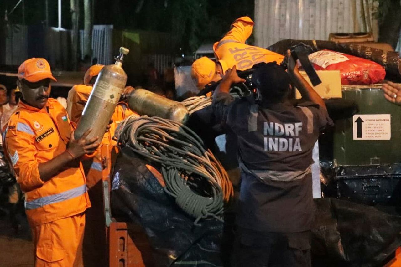 In this image provided by the Information and Public Relations Department, Government of Sikkim, National Disaster Response Force personnel prepare for a rescue operation at the site of an under-construction tunnel at a hydropower project in Samardung village, about 40 kilometers (25 miles) from Gangtok, India, late Monday, July 20, 2026 Rescue teams prepare their equipment in IndiaCredit: Government of Sikkim via AP