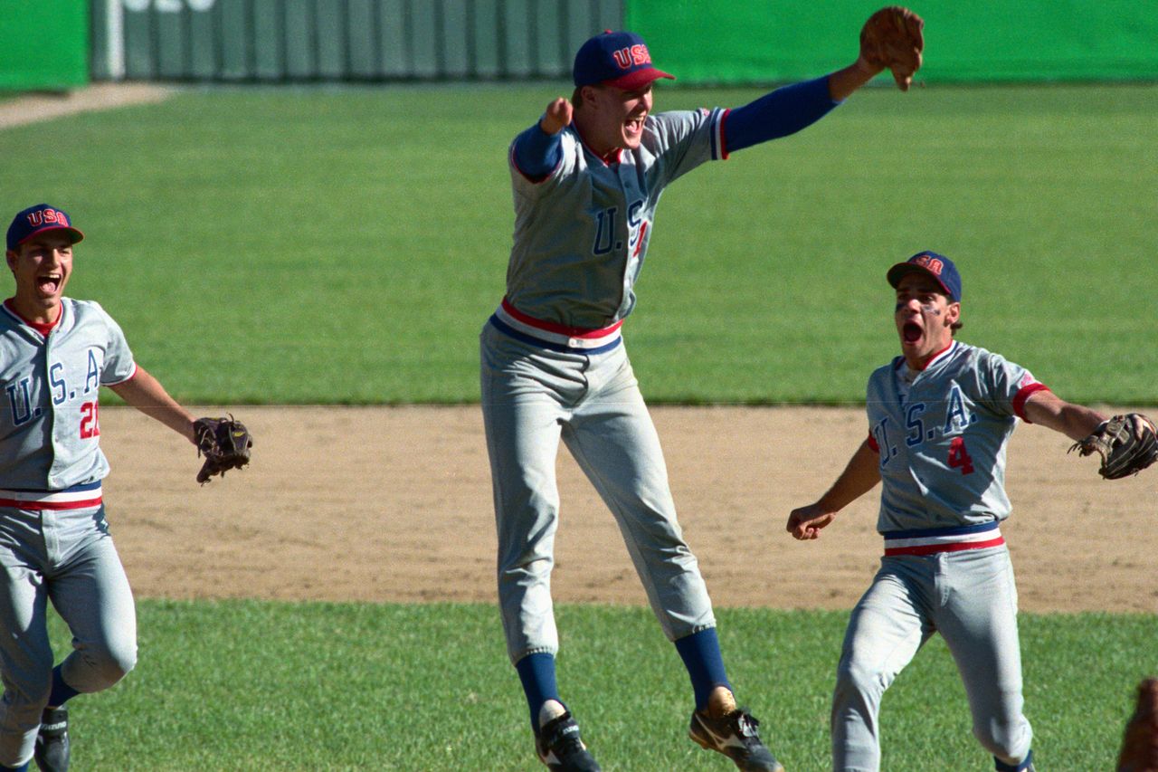 Seoul: USA's pitcher Jim Abbot, who pitched the whole game to defeat Japan 5-3 and take gold medal in this exhibition sport of the summer Olympics Sept. 28, leads the celebration with the help of shortstop David Silvestri. Jim Abbott at the 1988 OlympicsCredit: Bettmann Archive/Getty