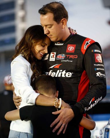 Kyle Busch, driver of the #51 Safelite Toyota, wife Samantha and son Brexton embrace on the grid prior to the NASCAR Camping World Truck Series North Carolina Education Lottery 200 at Charlotte Motor Speedway on May 27, 2022 in Concord, North Carolina. Samantha, Kyle and Brexton Busch on May 27, 2022 (stock image).Credit: Jared C. Tilton/Getty