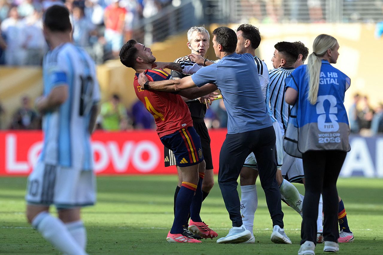 Argentina's head coach Lionel Scaloni (C,R) tries to intervene as Argentina's midfielder #05 Leandro Paredes clashes with Spain's defender #04 Eric Garcia at the end of the 2026 World Cup football tournament final match between Spain and Argentina at the New York/New Jersey Stadium in East Rutherford on July 19, 2026 Argentina’s head coach Lionel Scaloni tries to intervene as Argentina’s midfielder #05 Leandro Paredes clashes with Spain’s defender #04 Eric Garcia at the end of the 2026 World Cup final.Credit: JUAN MABROMATA / AFP via Getty