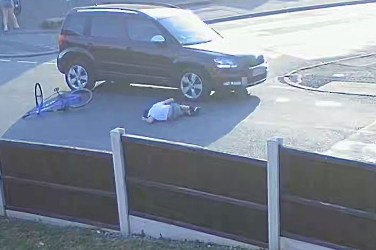 CCTV FOOTAGE CAPTURED THE MOMENT LEWIS COPE, 10, COLLIDED INTO A CAR ON HIS BIKE) A 10-year-old is lucky to be alive after he ploughed his bike into a moving car - that he didn't hear approach as he was blasting out music. Rich Cope, from Chesterfield, Derbyshire, rushed out the house on June 24 Lewis Cope after his crashCredit: Kennedy News and Media