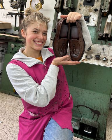 Giulia Rhodes, Woman Details Year Learning to Handcraft Luxury Shoes in Italy Worth Hundreds of Dollars Giulia Rhodes holding up a pair of shoes she made.Credit: Giulia Rhodes
