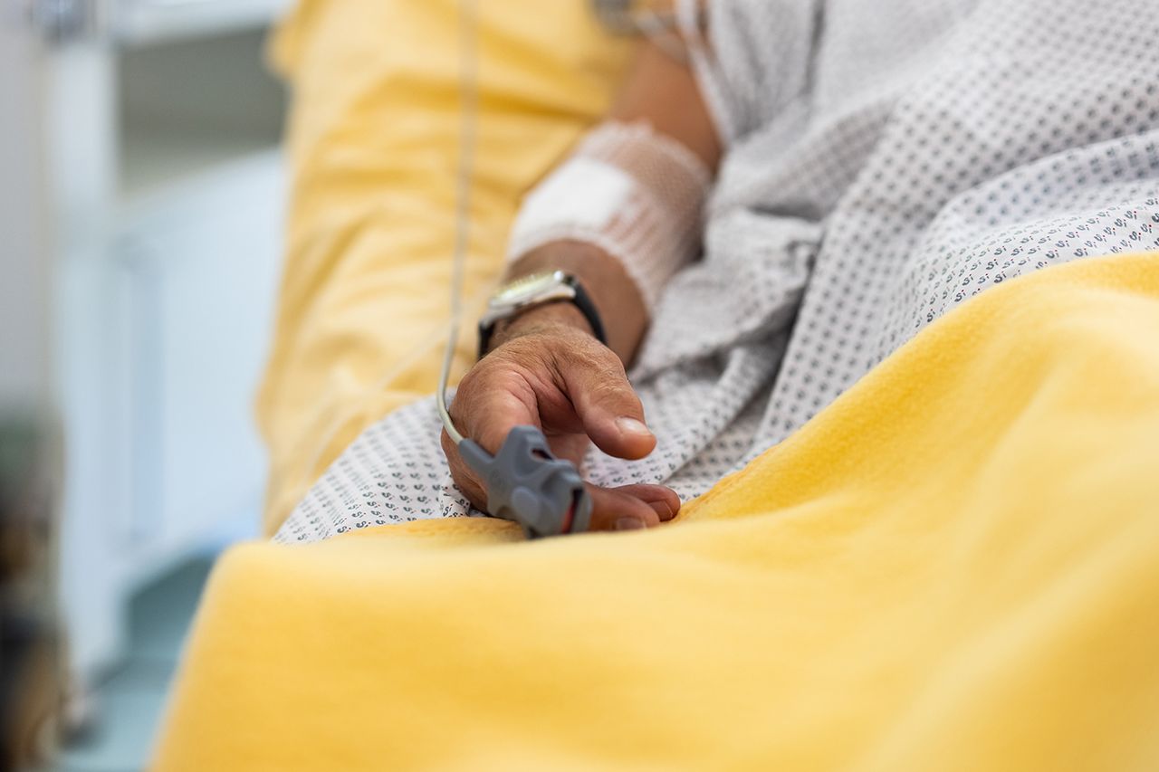 male patient's hand in a hospital bed with oximeter A patient (stock image)Credit: Getty
