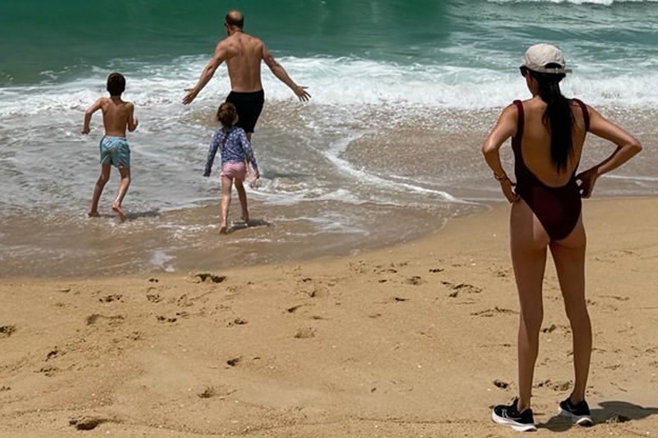 Prince Archie, Princess Lilibet, Prince Harry and Meghan Markle on the beach from new summer holiday pics, posted on July 23Credit: Meghan Markle/Instagram