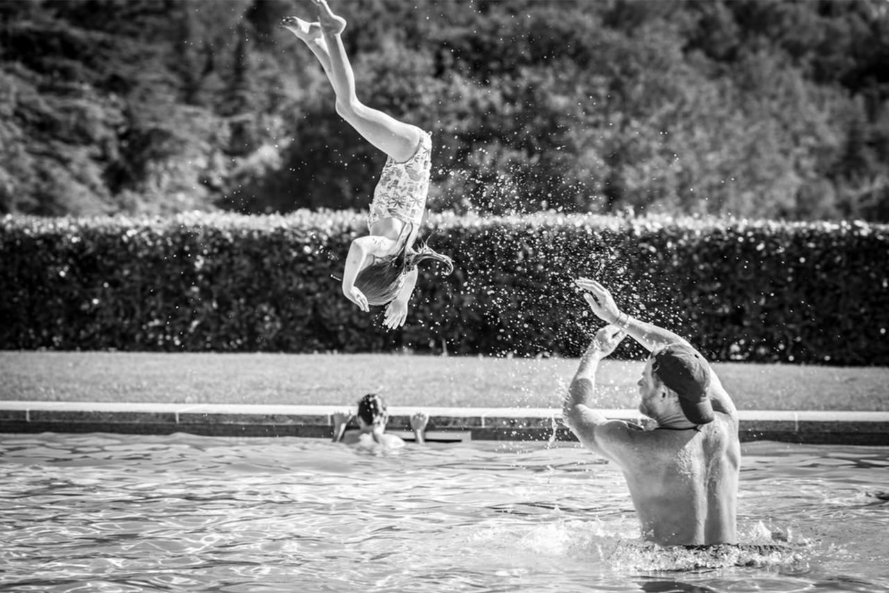 Prince Harry plays with Princess Lilibet and Prince Archie in the pool in Meghan Markle’s photos from their family’s summer vacation, posted on July 23, 2026Credit: Meghan Markle/Instagram
