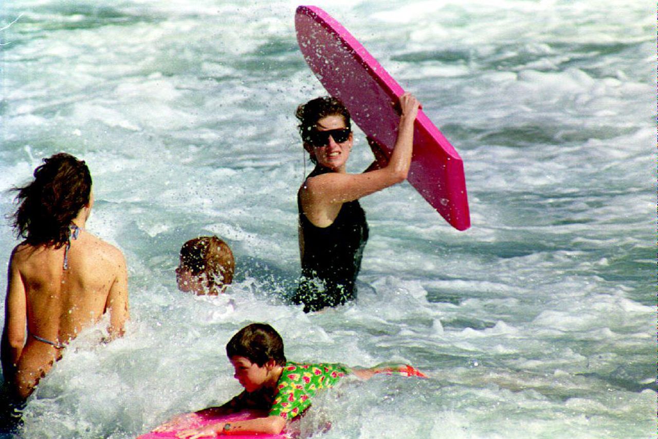 Princess Diana and Prince Harry enjoy the waters on the island of Nevis in the Caribbean in January 1993.Credit: PAUL J. RICHARDS/AFP via Getty