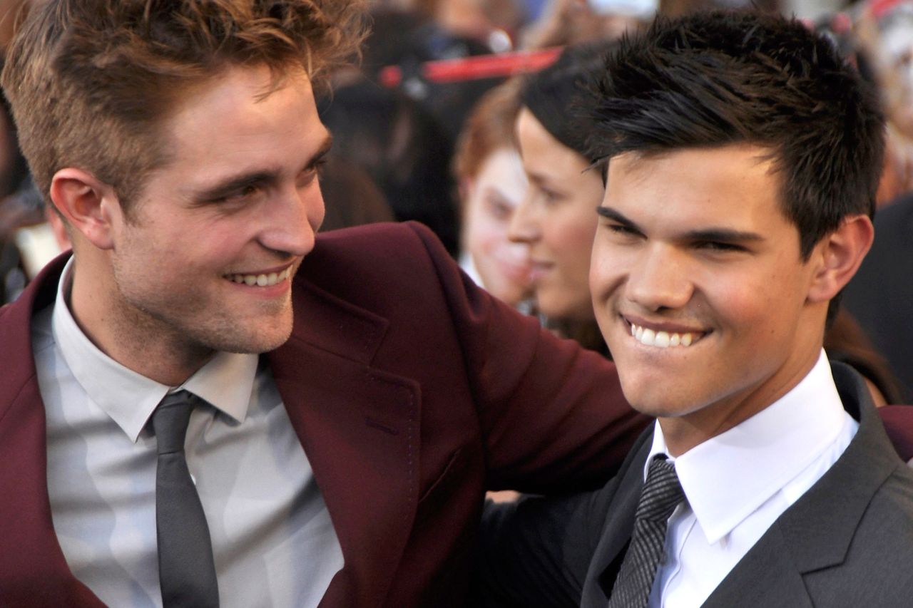 Robert Pattinson and Taylor Lautner smiling at an event Robert Pattinson (left) and Taylor Lautner (right) in 2010.Credit: Newscom/Getty